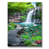 A vibrant forest landscape diamond painting featuring a waterfall cascading over rocks and lush green foliage.