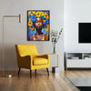 A vibrant painting of an African woman with blue and yellow flowers, displayed in a modern living room setting.
