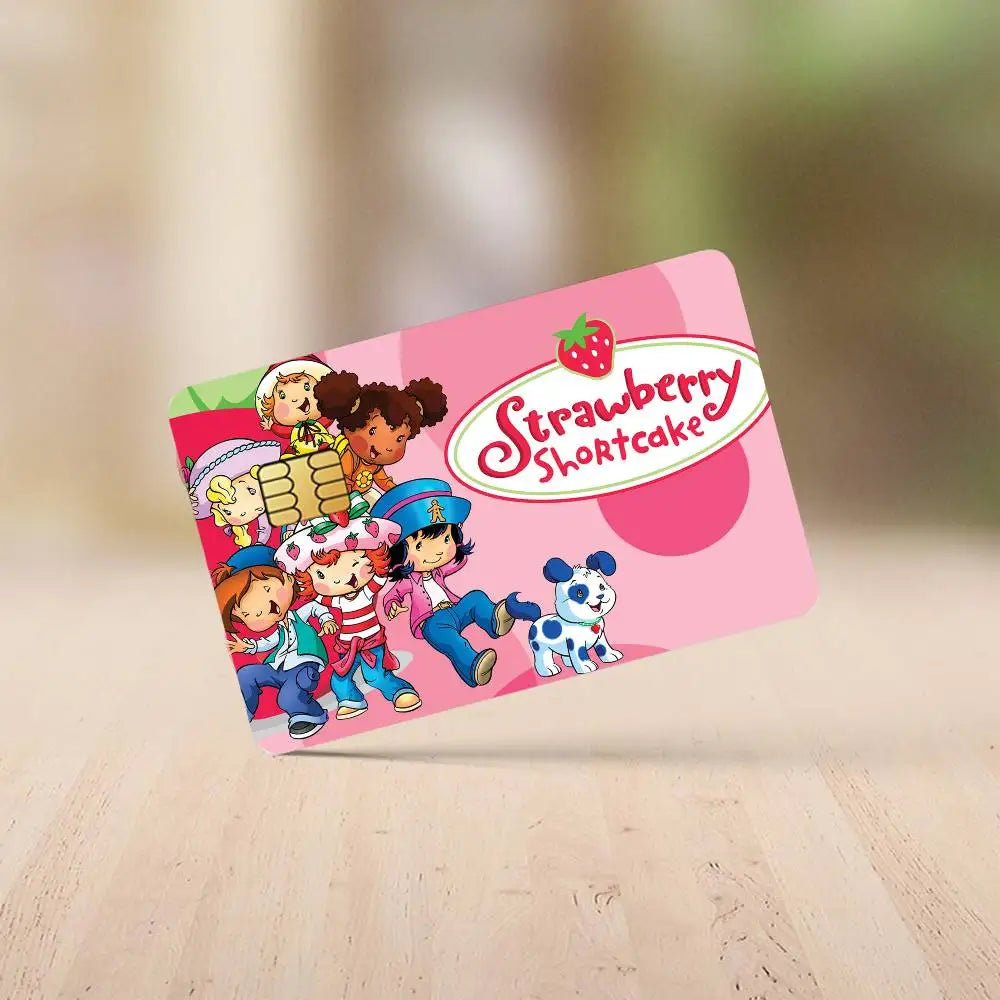 A pink credit card sticker set featuring various Strawberry Shortcake cartoon characters.