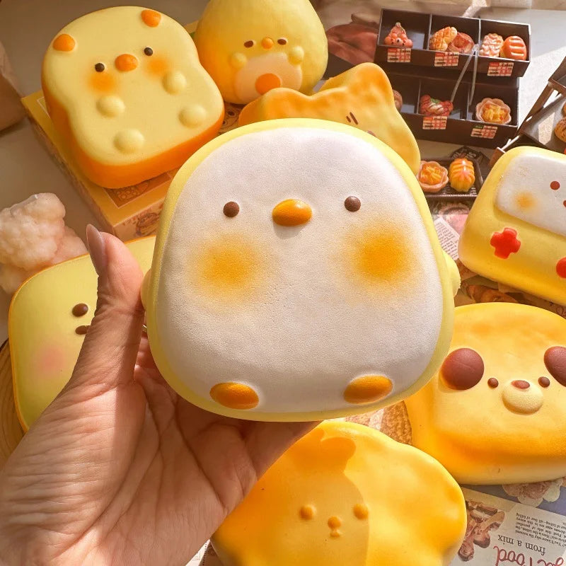 Cute Cartoon Bread Squishy Toy – Stress Relief & Sensory Fidget