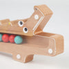 A wooden test tube clip beads toy for color sorting, featuring a light wood texture and various colored beads.