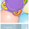 A purple pull-string spinning top battle game with colorful fruit designs on the side.