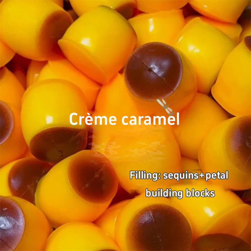 Yellow caramel pudding squishy stress relief balls filled with sequins and petal building blocks