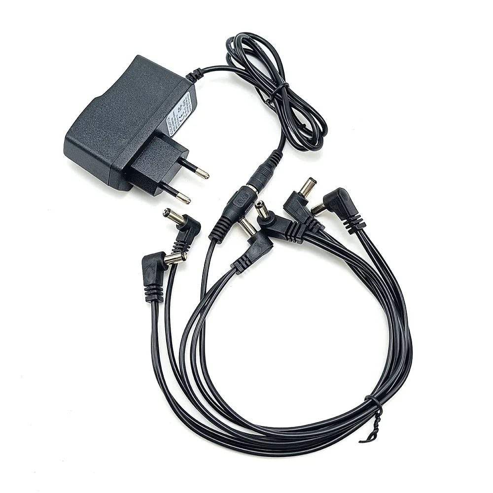 Black power supply adapter cable for a 9V 1A guitar pedal.