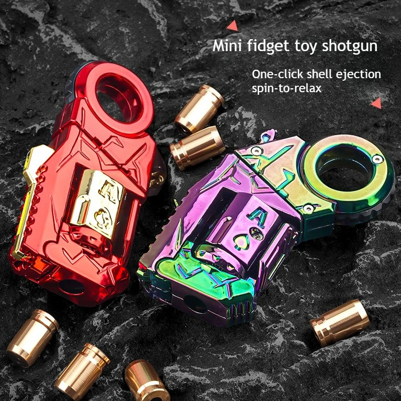 A red and purple mini fidget toy shotgun with a shell ejection and spin-to-relax mechanism displayed on a dark surface.