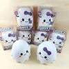 A collection of ghost squishy stress relief toys in clear packaging and loose, white ghost-shaped squishies.