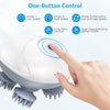 A hand is operating a white electric massager with a finger to switch between low, high, and alternative speed modes.
