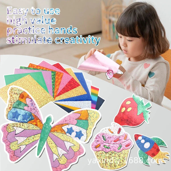 A young girl is using a foil art kit to create butterfly and cupcake shapes for a craft activity.