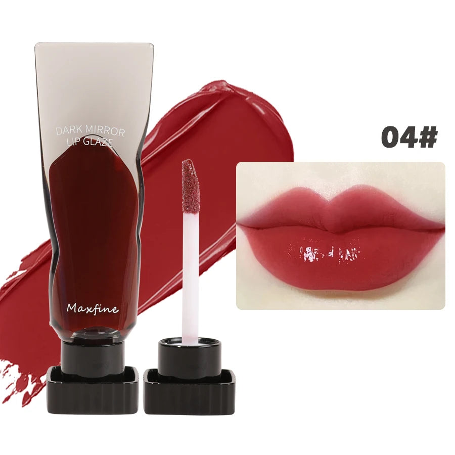 A tube of dark mirror lip glaze and a wand applicator for the Maxfine product, shown next to a close-up of red lipstick on li