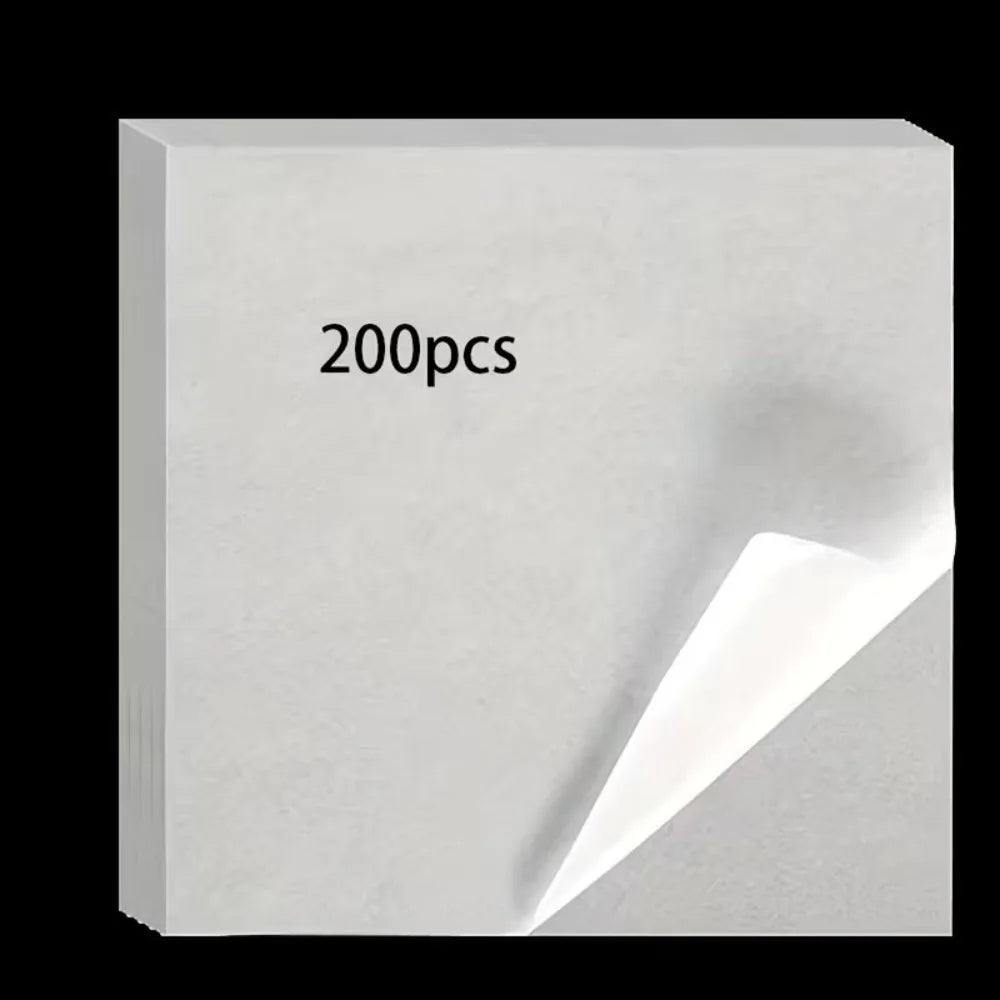 A white rectangular block of double-sided diamond painting release paper with the text 200pcs visible on the top surface.