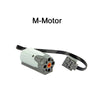 An M-Motor with attached wires and a small mounting bracket.