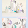 A collection of Miffy Dream keychains featuring a white rabbit charm in various colors and styles.