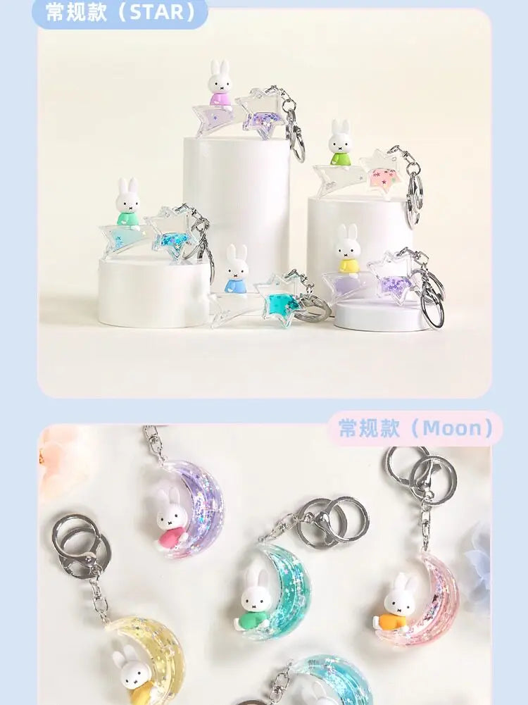 A collection of Miffy Dream keychains featuring a white rabbit charm in various colors and styles.