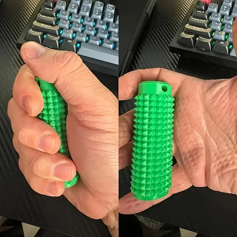 A hand holds a bright green spiky sensory keychain designed for anxiety relief.
