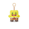A yellow, fuzzy monster plush resembling SpongeBob SquarePants wearing a suit and attached to a keyring.