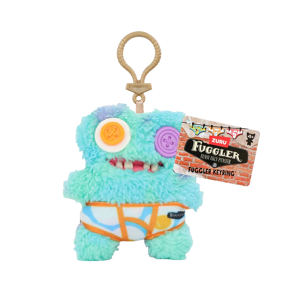 A light blue plush toy of a monster wearing an orange and white striped outfit, hanging from a gold-colored loop.