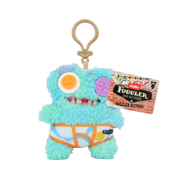 A light blue plush toy of a monster wearing an orange and white striped outfit, hanging from a gold-colored loop.