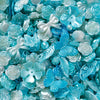 A close-up of iridescent blue and silver butterfly shell acrylic beads for DIY jewelry making.