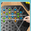 A set of stretching rubber bands is shown stretched over four posts on a black board for a chain game.