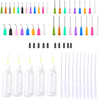 A collection of precision dispensing kit components including various colored needle tips and clear squeeze bottles.
