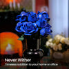 A bouquet of realistic blue roses in a black vase, set against a blurred background.