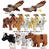 A set of marine animal building blocks featuring a bird, horses, and cattle in various colors.
