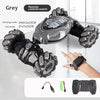 A grey remote control watch featuring climbing and flat modes, alongside an RC stunt car and accessories.