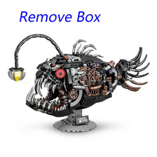 A black mechanical lantern fish model kit with intricate details and a curved light fixture.