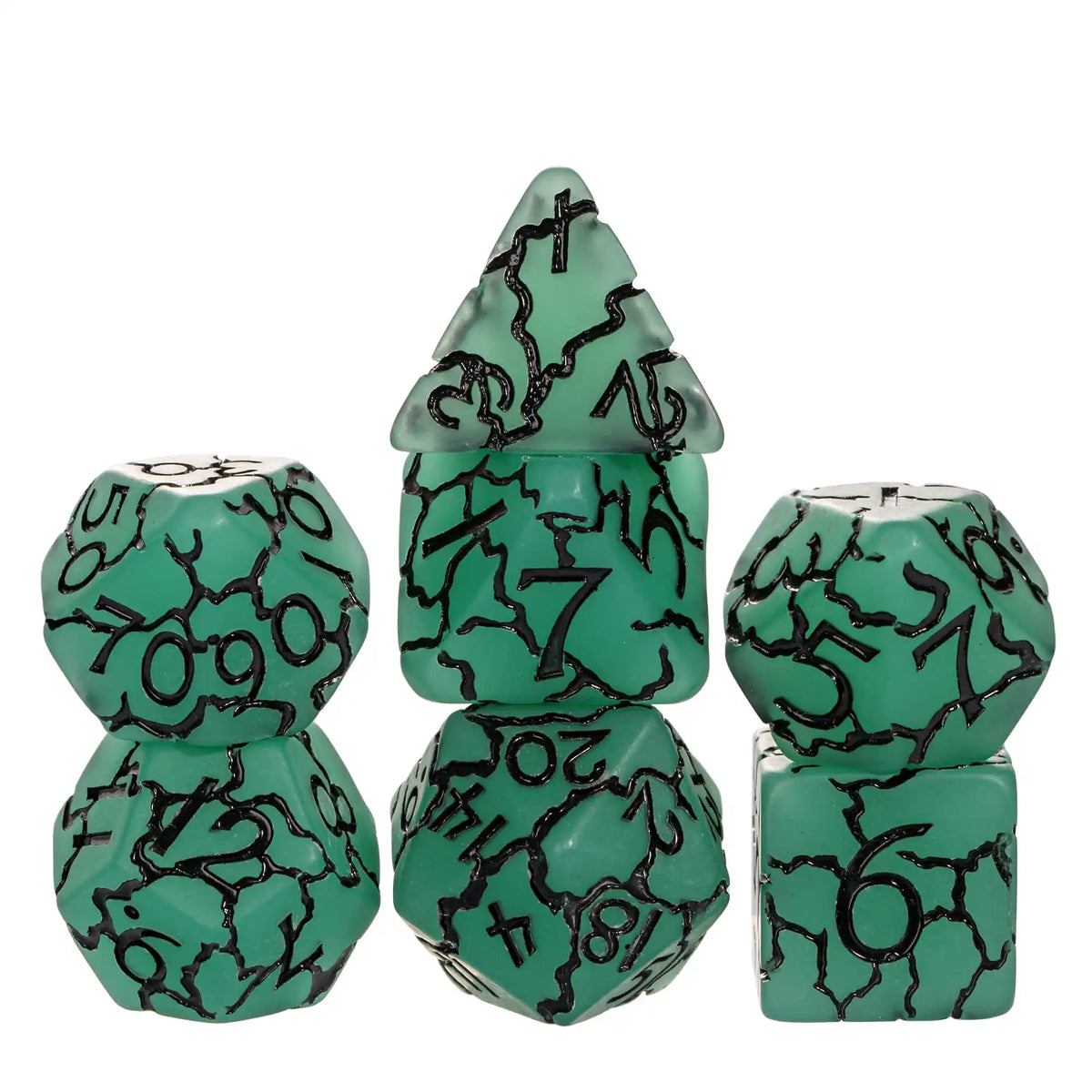 A set of seven frosted crack resin polyhedral dice in various sizes and colors.