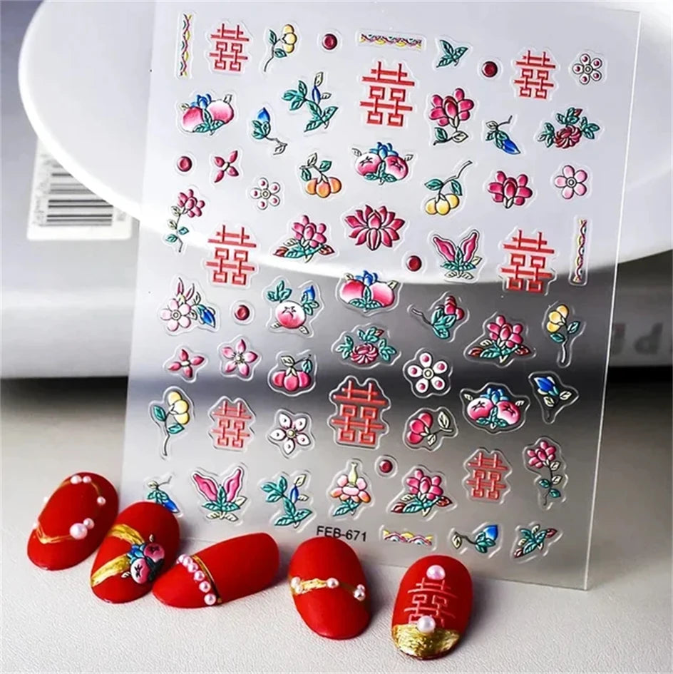 Clear stickers featuring red and pink floral and geometric designs for nail art