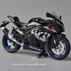 Black Suzuki GSX-R1000R diecast motorcycle model with a removable stand