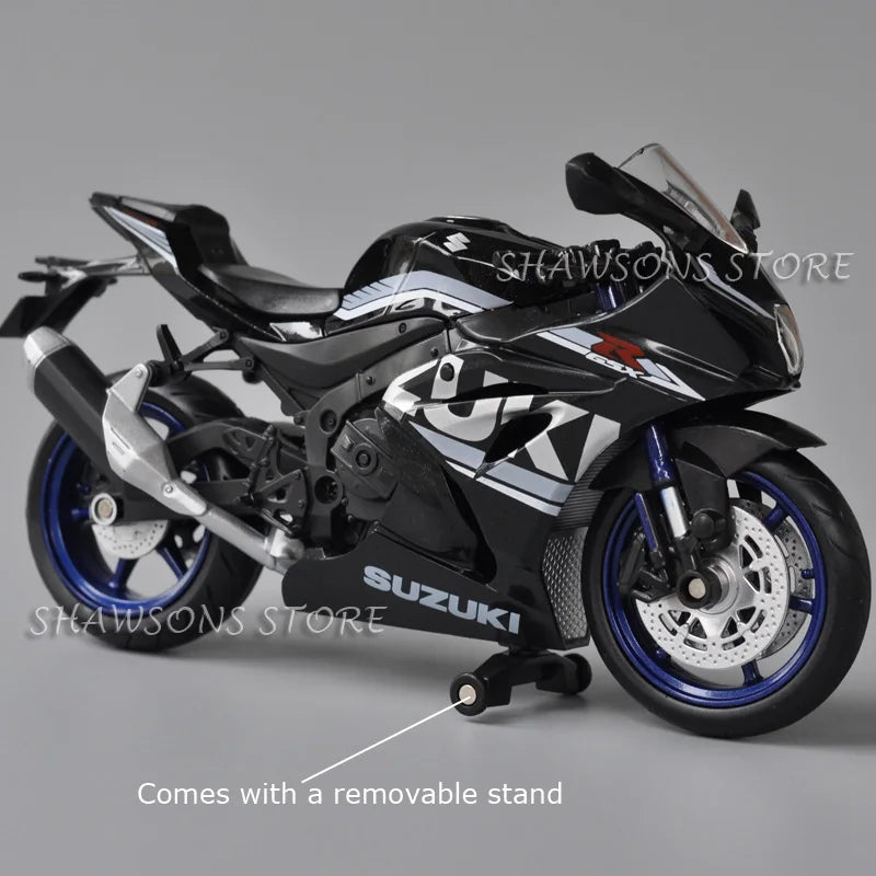 Black Suzuki GSX-R1000R diecast motorcycle model with a removable stand