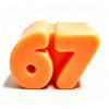 An orange squeeze stress relief toy shaped like the number 67, shown from a top-down angle.