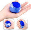 A hand holds a blue water bouncing ball with white accents, demonstrating its size and texture.