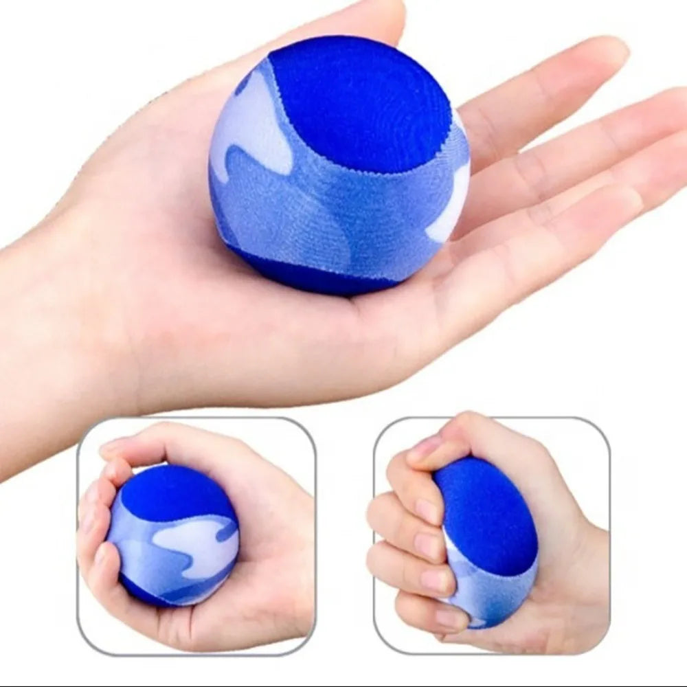 A hand holds a blue water bouncing ball with white accents, demonstrating its size and texture.