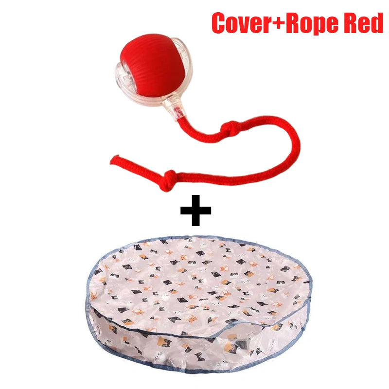 Red cover and rope toy with a rolling ball next to a flat, patterned fabric base.
