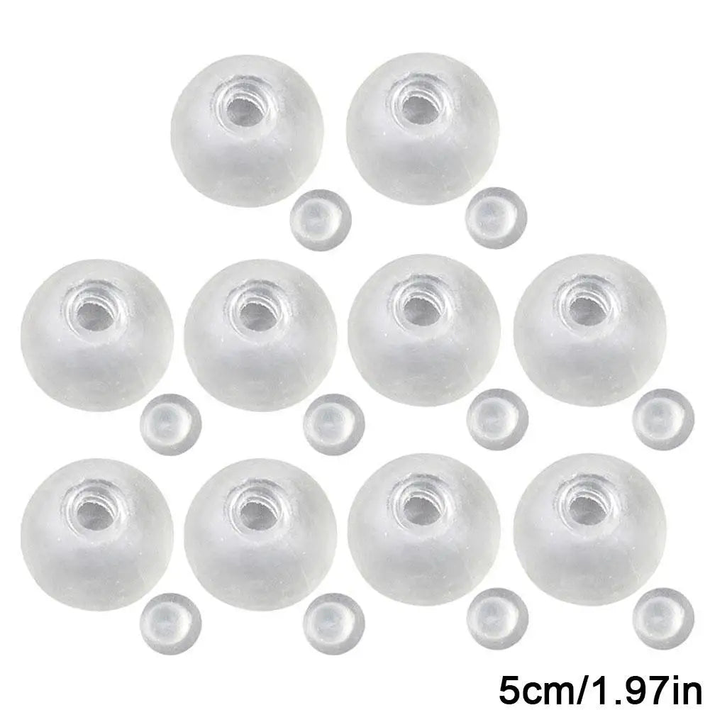 A collection of clear, spherical squishy stress ball covers and refills.