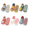 A pack of six cotton socks featuring cartoon animals with non-slip grips for kids.