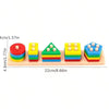 A set of colorful, triangular and rectangular shape-matching blocks for toddlers in red, yellow, green, blue, and orange.