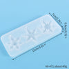 A translucent silicone mold with festive snowflake designs for jewelry and craft projects.