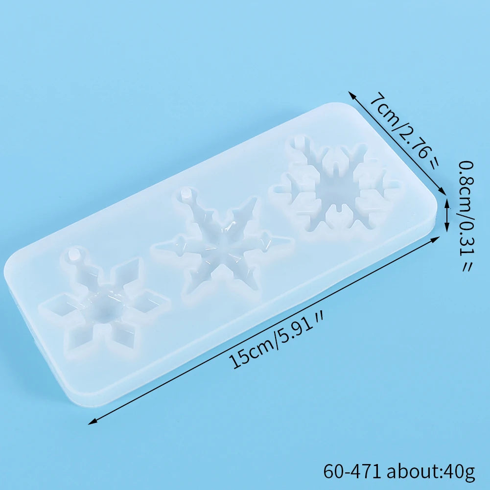 A translucent silicone mold with festive snowflake designs for jewelry and craft projects.