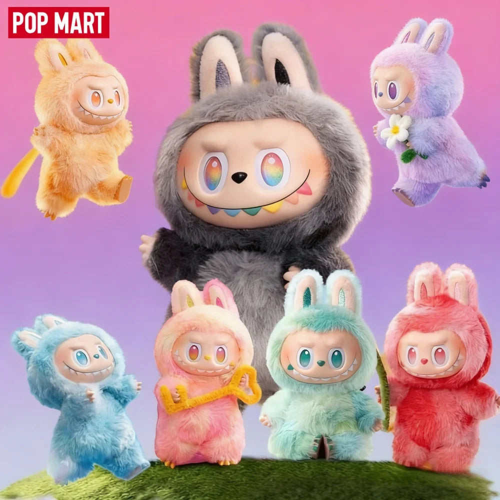 A collection of Labubu vinyl plush pendants featuring various monster characters in pastel colors and textures.