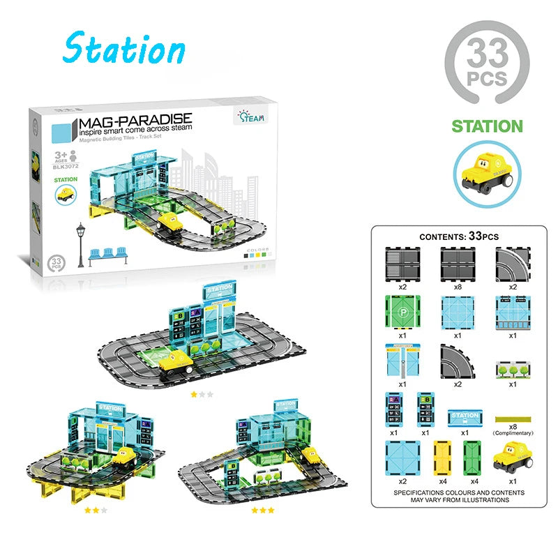 A box of MAG-PARADISE magnetic building tiles set for creating a road and rail track with an electric car.