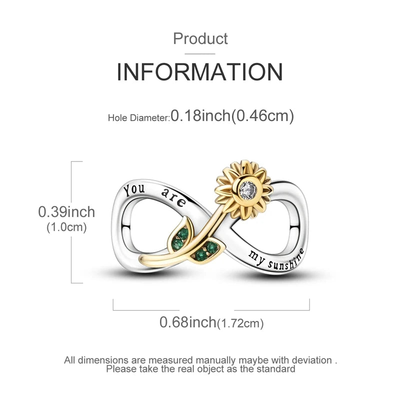 A sterling silver heart charm featuring a knot design with a sun motif and a small green leaf detail.
