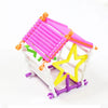 A colorful stick building block structure featuring pink, orange, and yellow pieces.