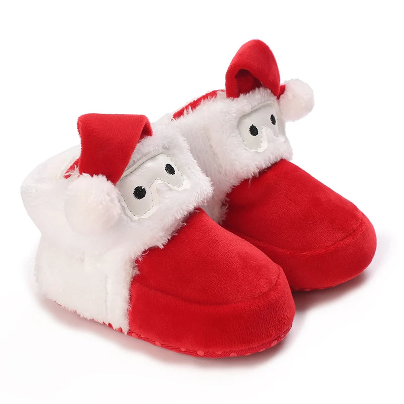 A pair of adorable animal-themed baby first walker shoes resembling Santa boots with white fur and red accents.