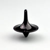 A black metal fidget spinner with a smooth, tapered design.