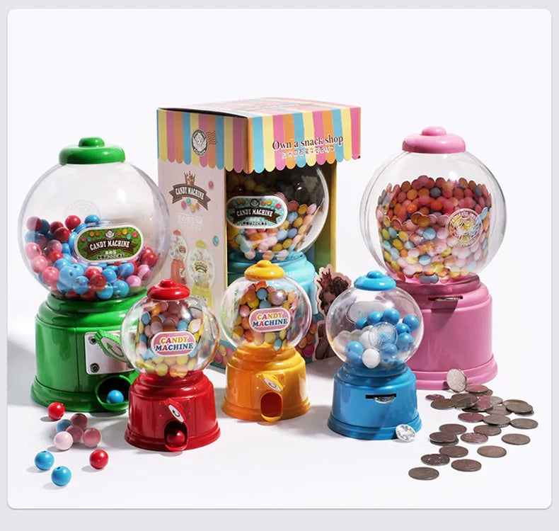 A collection of colorful candy machines and a box labeled Own a Snack Shop for kids