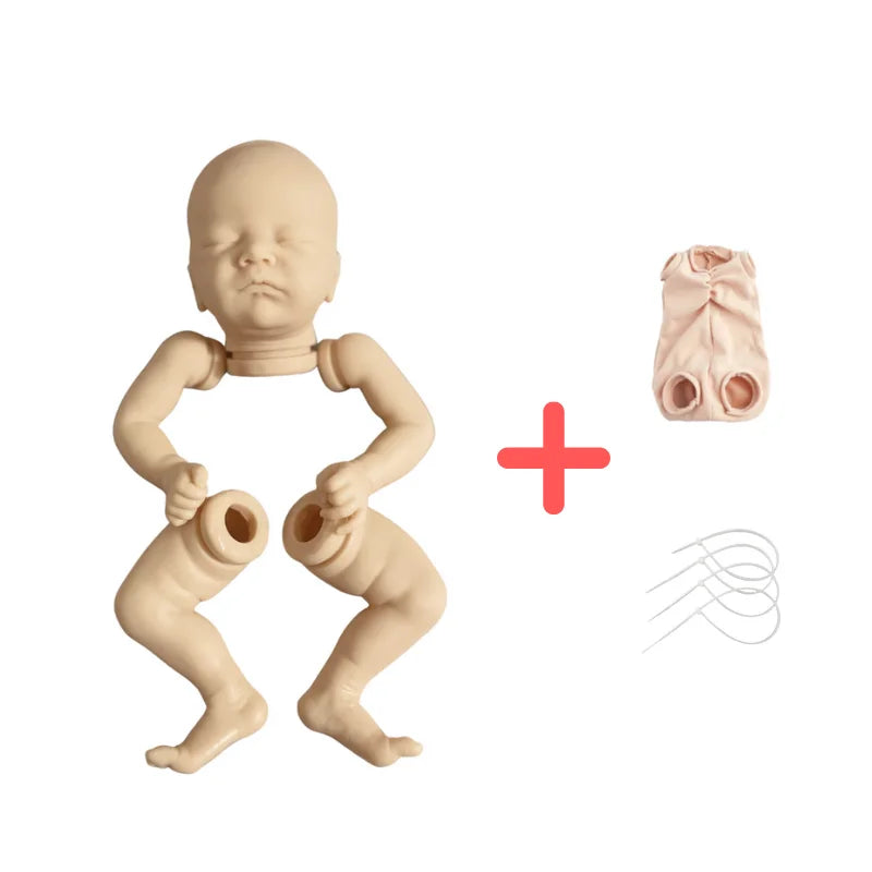 A beige vinyl reborn doll kit featuring a 17-inch Charlotte with a cloth body and sculpting tools.