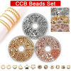 A set of gold and silver plated beads for jewelry making, including various shapes like round, heart, star, and square.